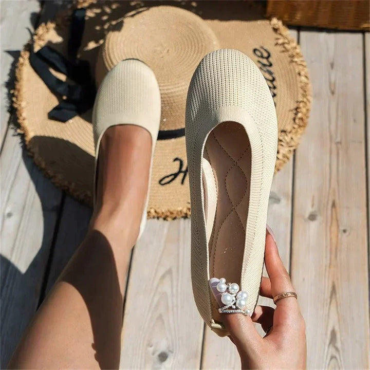 Stylish grey ballet flats for women, offering everyday comfort and a lightweight feel.