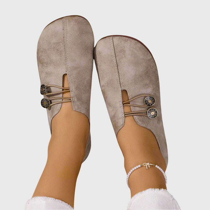 Barefoot feel women's slip-on flats with adjustable toggle lace for comfortable, versatile casual style.