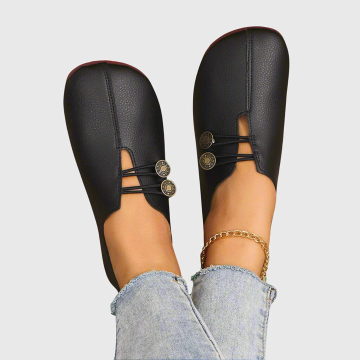 Women's everyday slip-on flats featuring a barefoot feel, toggle lace, & ultimate comfort for walking.