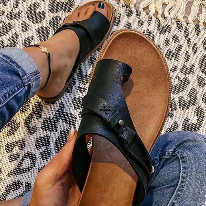 Women's comfortable slip-on summer sandals in a neutral tone, ideal for casual wear