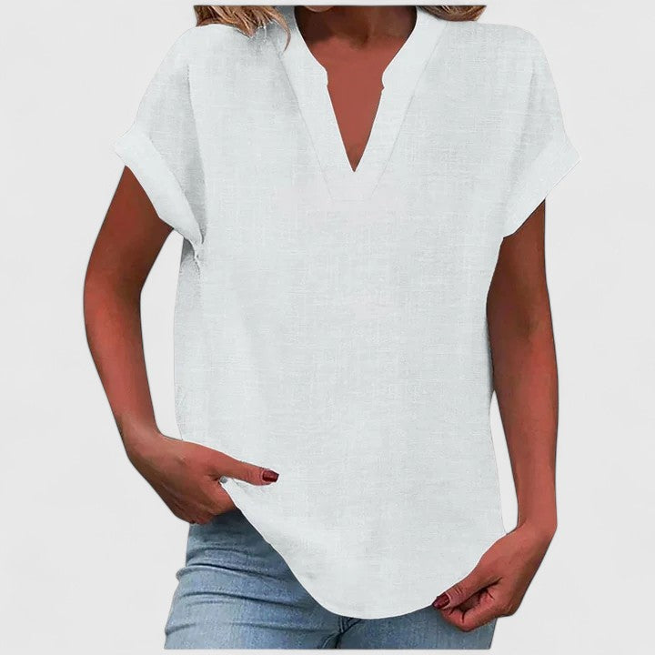 Lightweight V-neck women's blouse, comfortable short sleeve top ideal for warm weather and chic fashion.