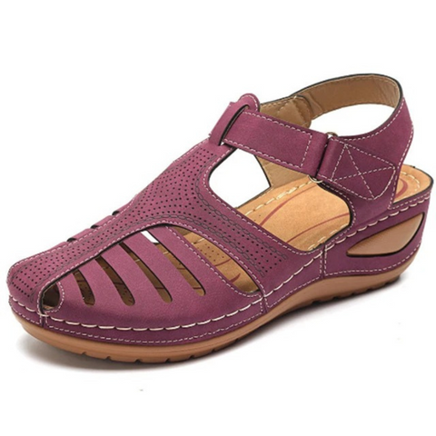 Adjustable strap women's flat sandals with a chic cutout pattern, offering superior comfort for walking