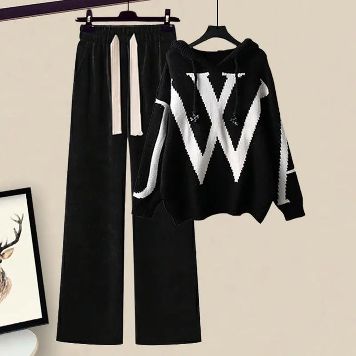 Women's casual & elegant fall fashion set: knit sweater and comfortable wide-leg pants.