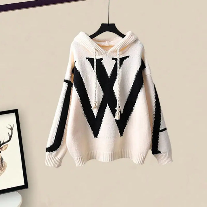 Elegant women's autumn outfit: soft knit sweater & flowing wide-leg pants matching set.