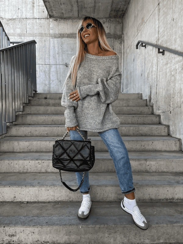 Fashionable off-shoulder women's knit sweater. Casual yet stylish for chilly autumn & winter days.