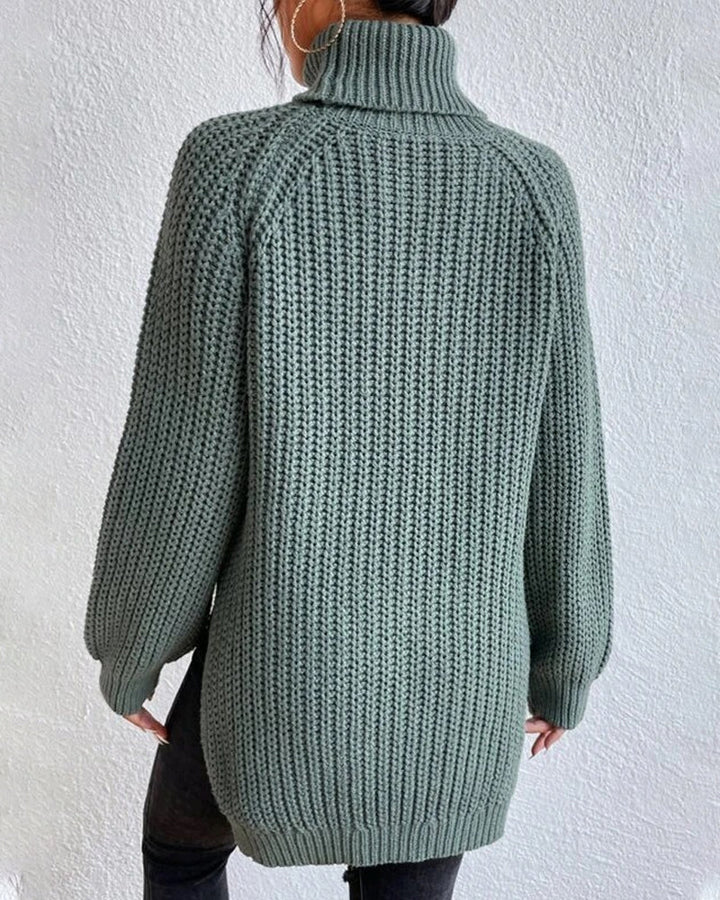 Close-up of the neckline on a women's cozy ribbed knit sweater, detailing its comfortable design.