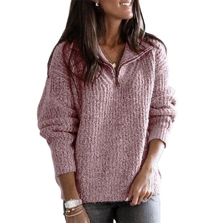 Blue women's long sleeve ribbed sweater with a zip-up neckline, comfortable knitwear for everyday.