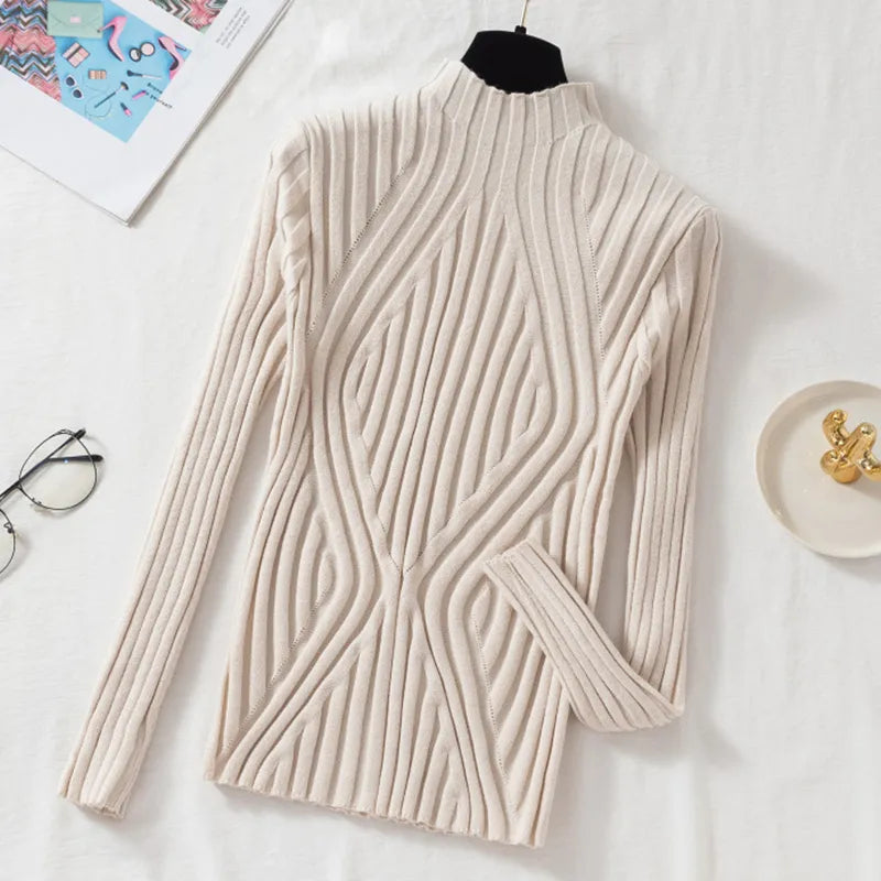 Stretch fit women's roll neck long sleeve top, providing effortless warmth & style for cooler days.