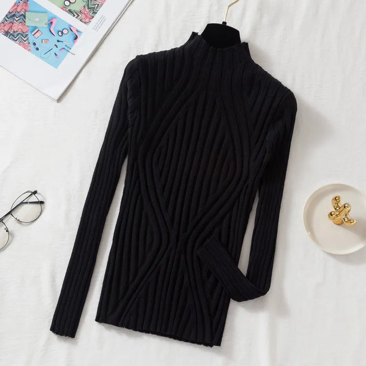 Women's long sleeve roll neck jumper, solid, offering warmth and a versatile autumn/winter look.
