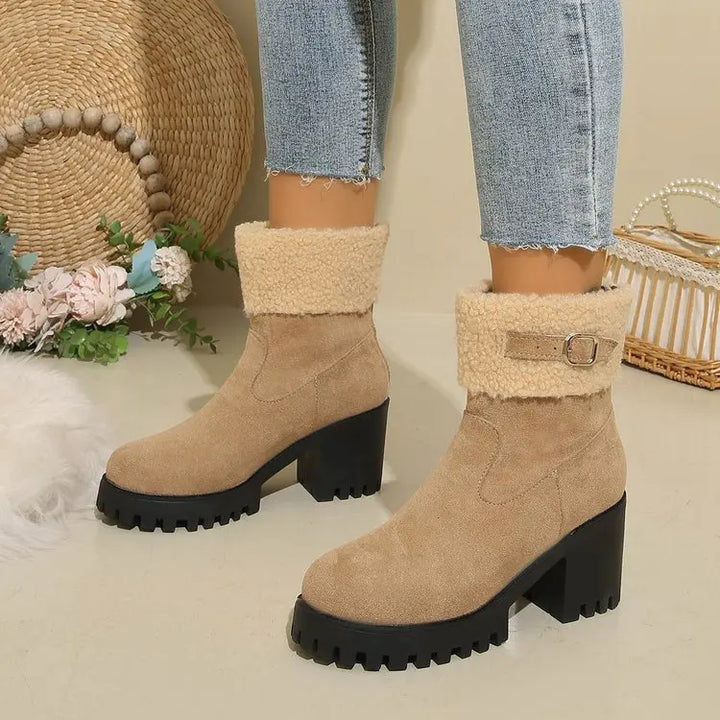 Elegant women's sherpa ankle boots, perfect for adding cozy style to any winter outfit.