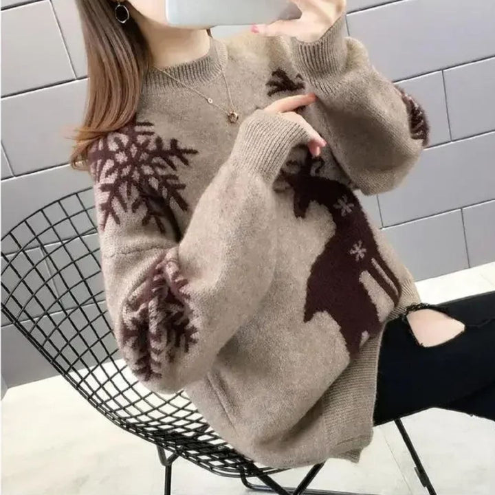 Soft knit women's sweater featuring a festive reindeer pattern, perfect for winter and holidays