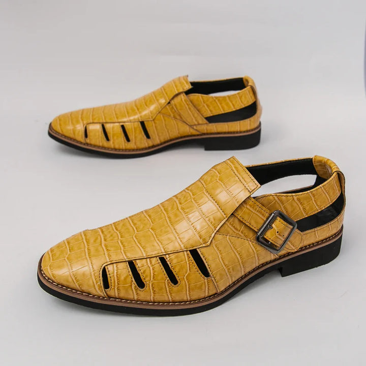 Side profile of women's open toe croc embossed sandals showing buckle details
