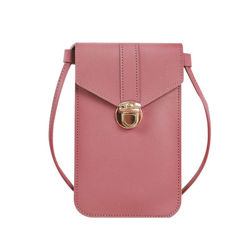 Detail of touchscreen window on women's crossbody phone bag, secure &amp; clear access to your device