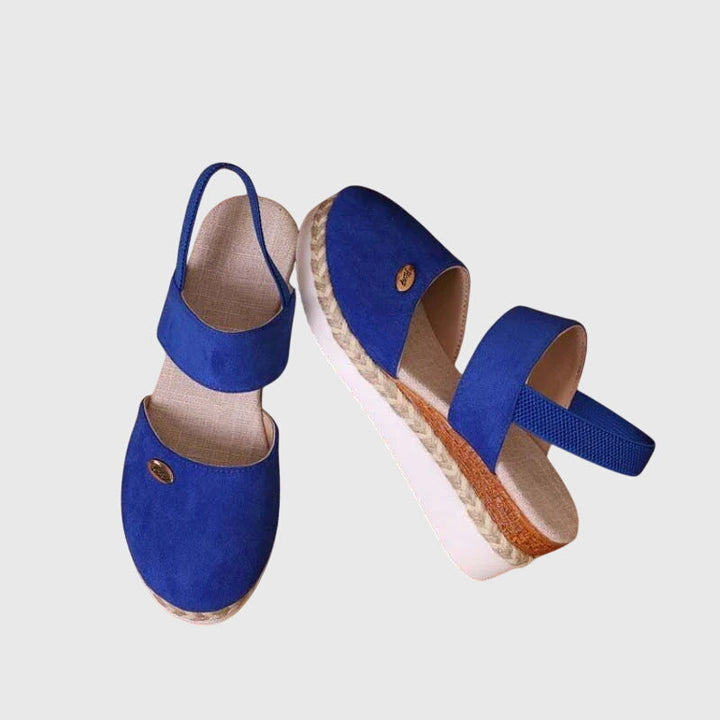 Black women's cushioned orthopedic sandals, providing arch support & pain relief for active walking.