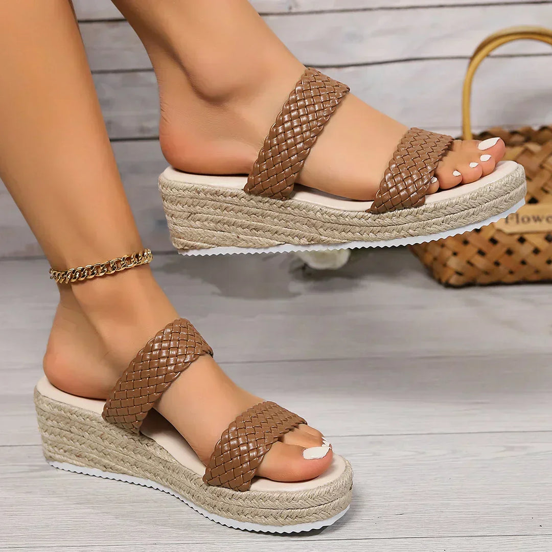 Supportive women's cushioned wedge sandals, offering comfort and style for daily activities.