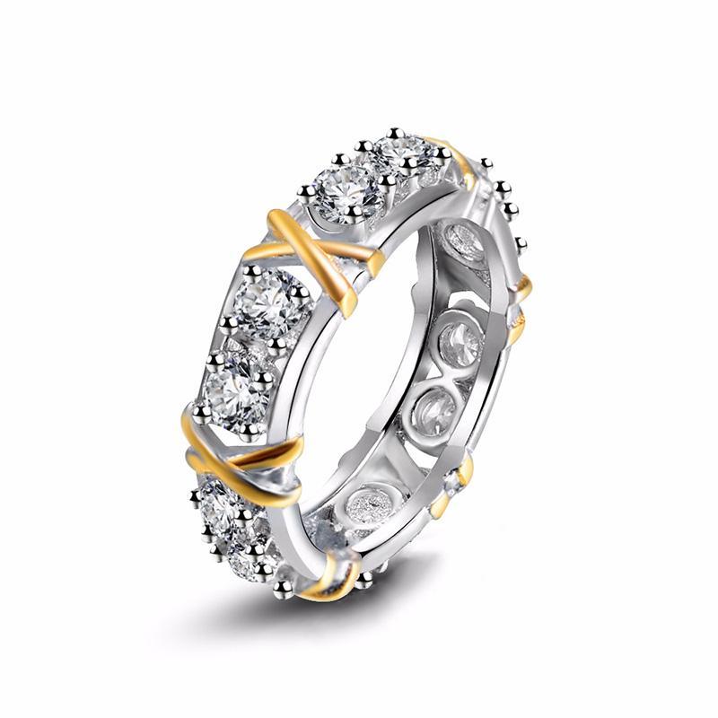Women's dichroic zircon ring with a radiant, iridescent stone