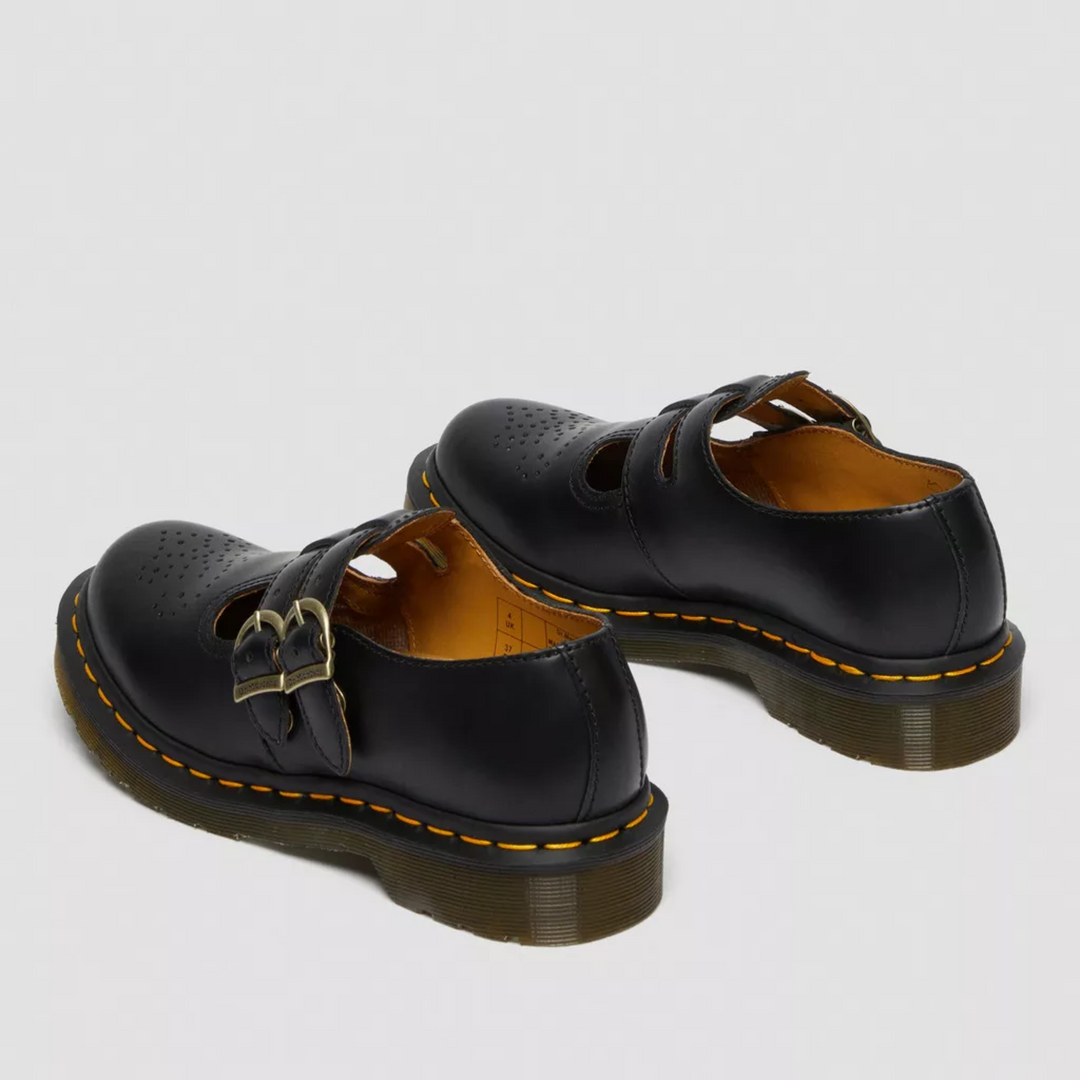 Edgy women's Mary Janes featuring a double buckle design, stylish and comfortable flats.