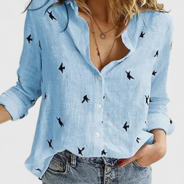 Modern women's button-down shirt, soft lapel collar, effortless style for various occasions.