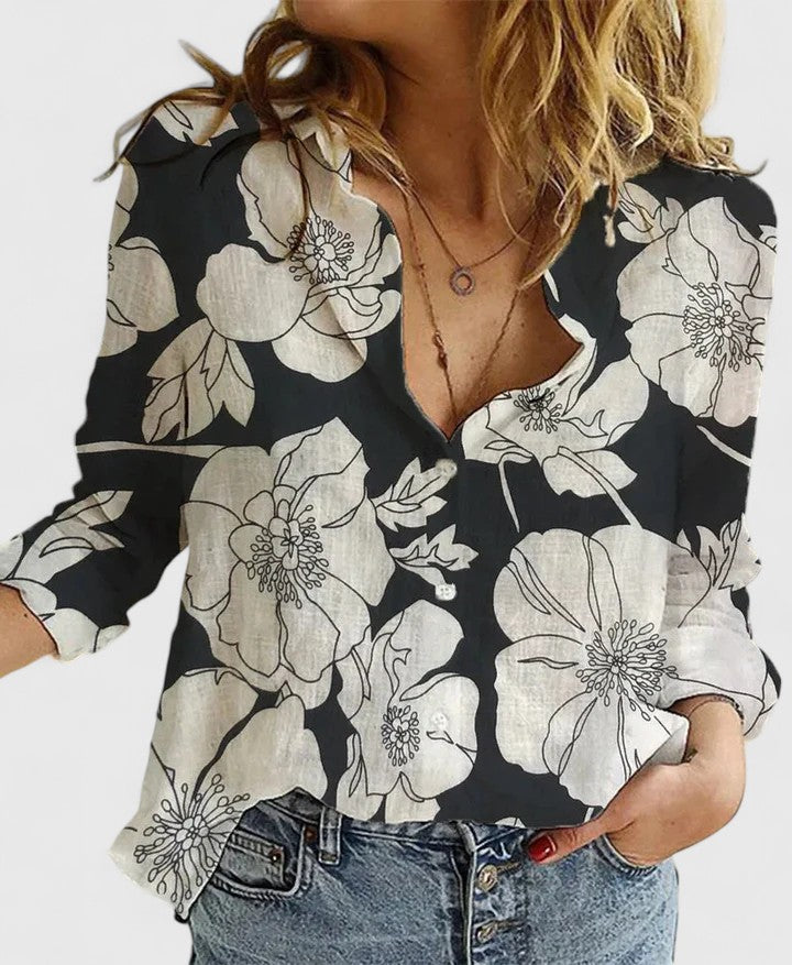 Stylish women's button-down long-sleeve shirt, relaxed fit, essential for a chic wardrobe.
