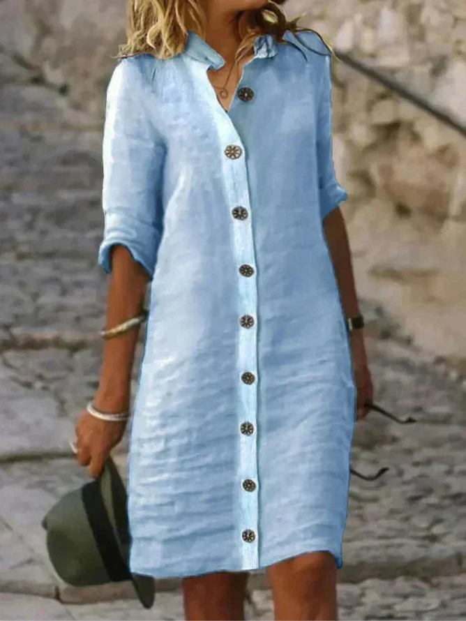 Chic women's button-down shirt dress. Comfortable, relaxed fit everyday dress with a stylish collared design.