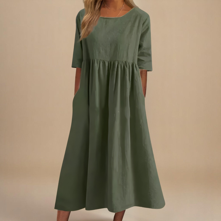 Women's effortless gathered waist midi dress with half sleeves & scoop neck, perfect for casual summer wear.