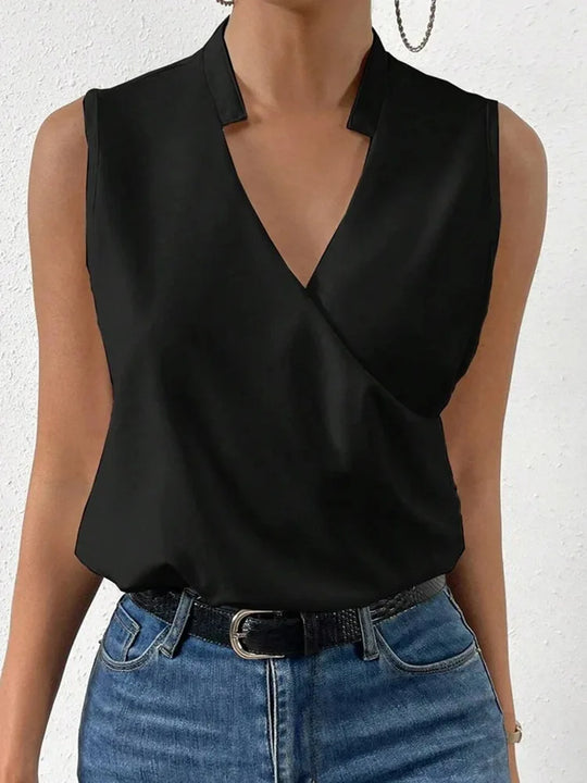 Elegant V-neck women's blouse, a versatile sleeveless top with a relaxed fit for stylish summer fashion.