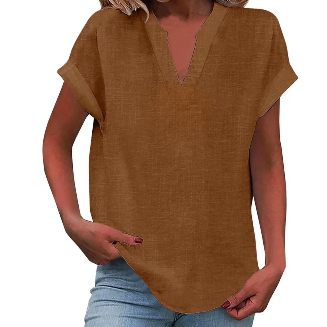 Comfortable V-neck short sleeve blouse for women, a loose fit summer top for everyday wear.