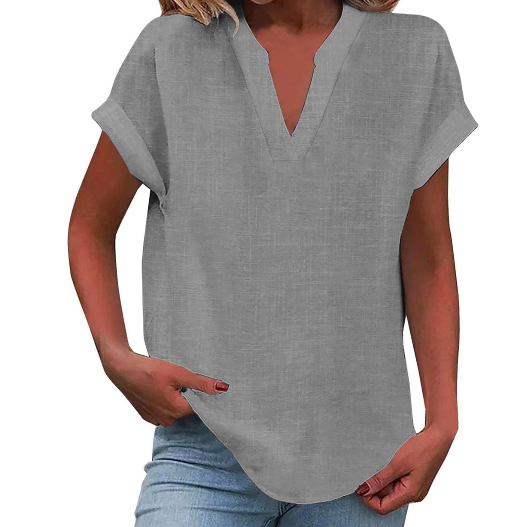 Women's short sleeve V-neck blouse, a loose fit summer top for everyday style.