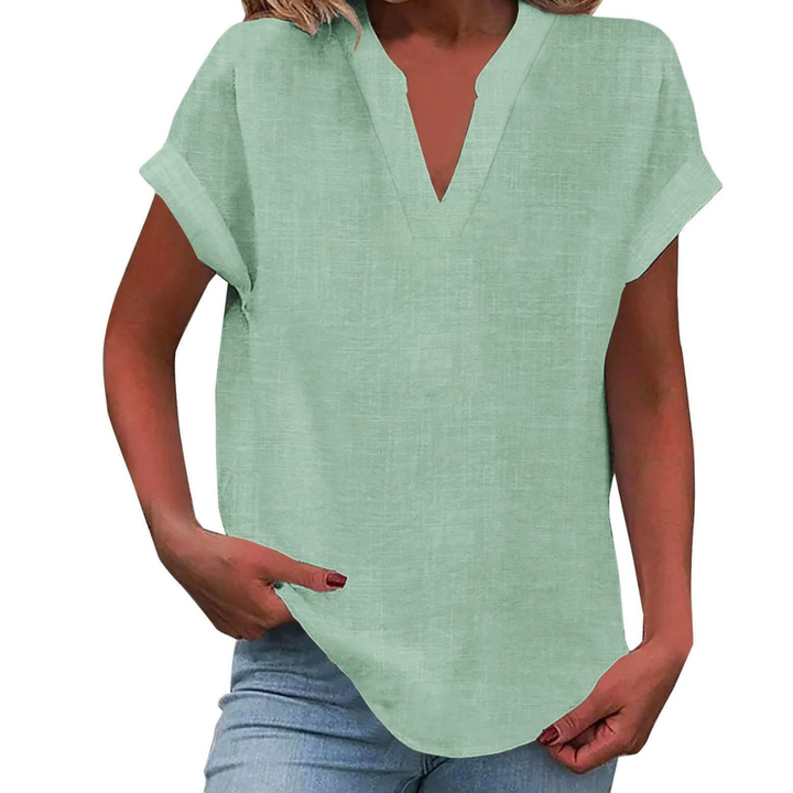 Versatile V-neck loose fit summer blouse, a comfortable short sleeve tunic for women.