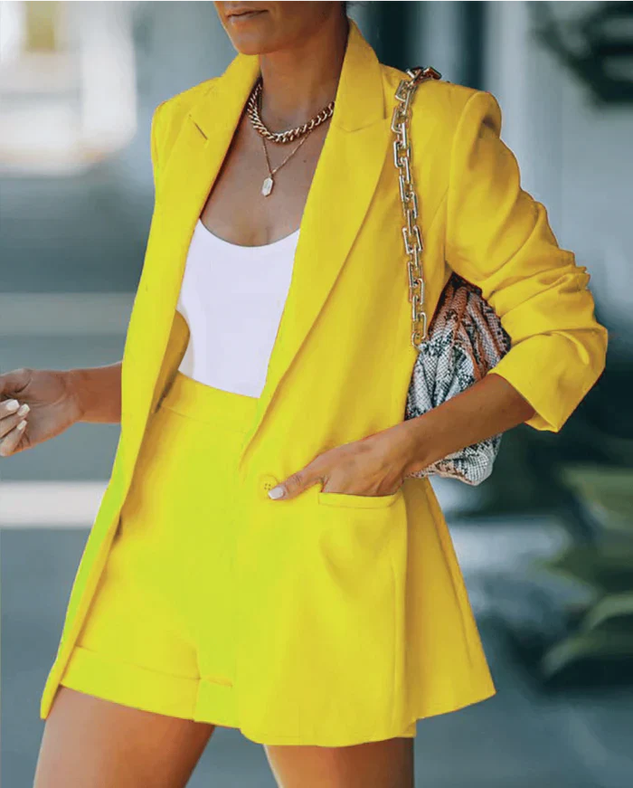 New women's elegant blazer & high-waisted shorts ensemble. Perfect for a chic spring & summer look.