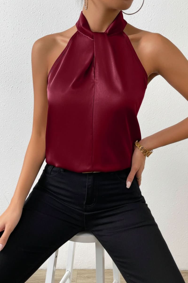 Elegant women's halter neck blouse with a stylish knot detail, a versatile sleeveless top for both casual and formal.