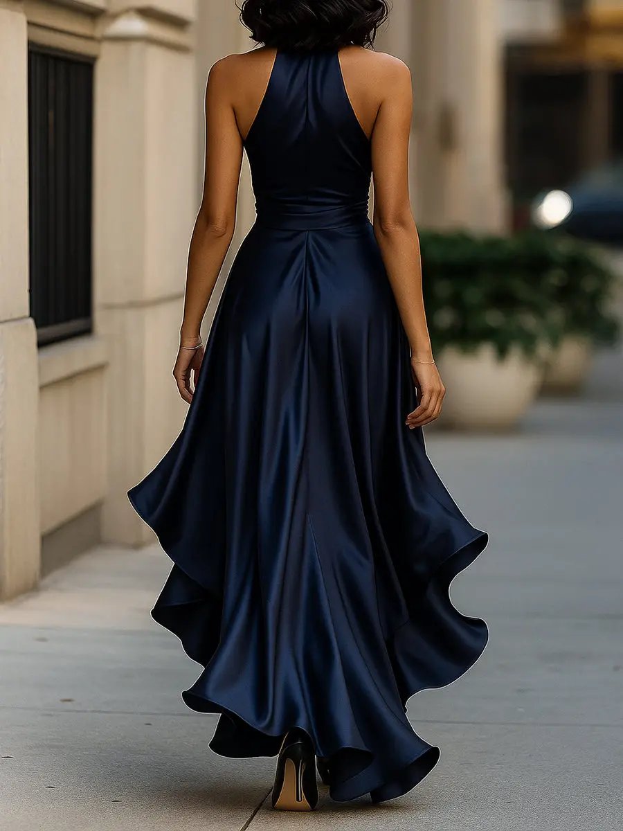 Elegant women's backless maxi dress with a halter neck and wrap waist. Ideal for evening wear.