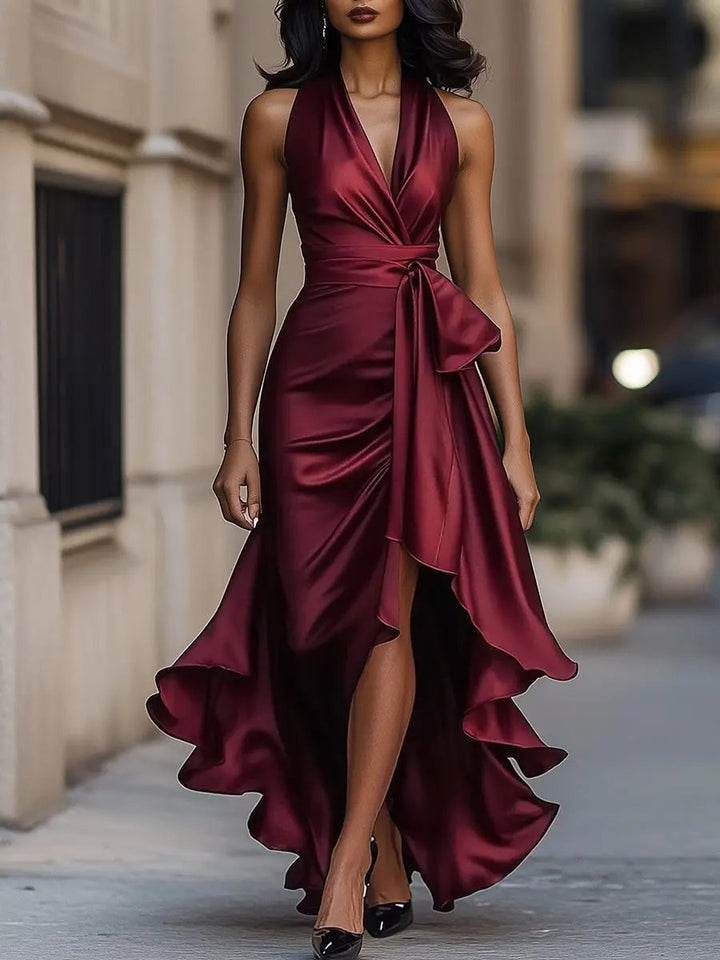 Chic women's halter neck evening gown, a long and flowing maxi dress for formal occasions.