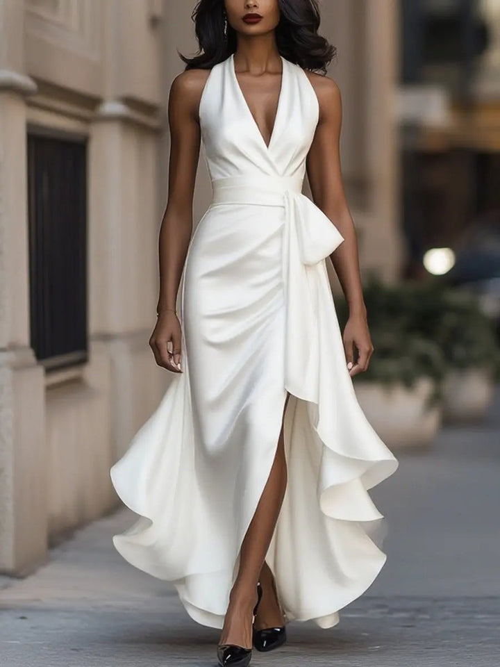 Sophisticated women's wrap waist halter neck maxi dress. Elegant and sleeveless, perfect for special events.