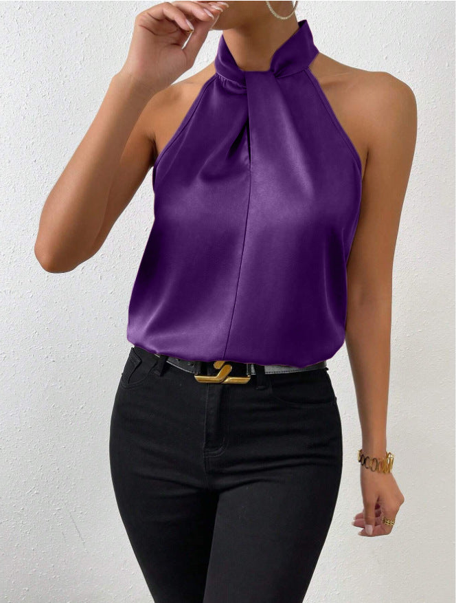Modern women's fashion top, sleeveless, elegant knot neck halter detail.