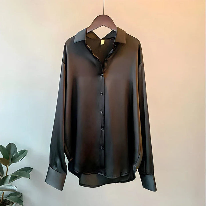 Fashionable ladies long sleeve top, an elegant blouse for chic women's office and work wear.