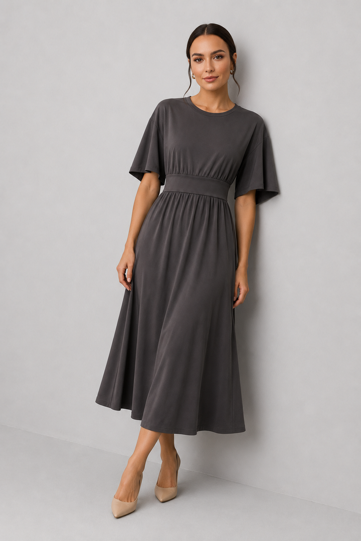 Casual yet elegant women's midi dress. Features comfortable wide sleeves & a fashionable waist belt.