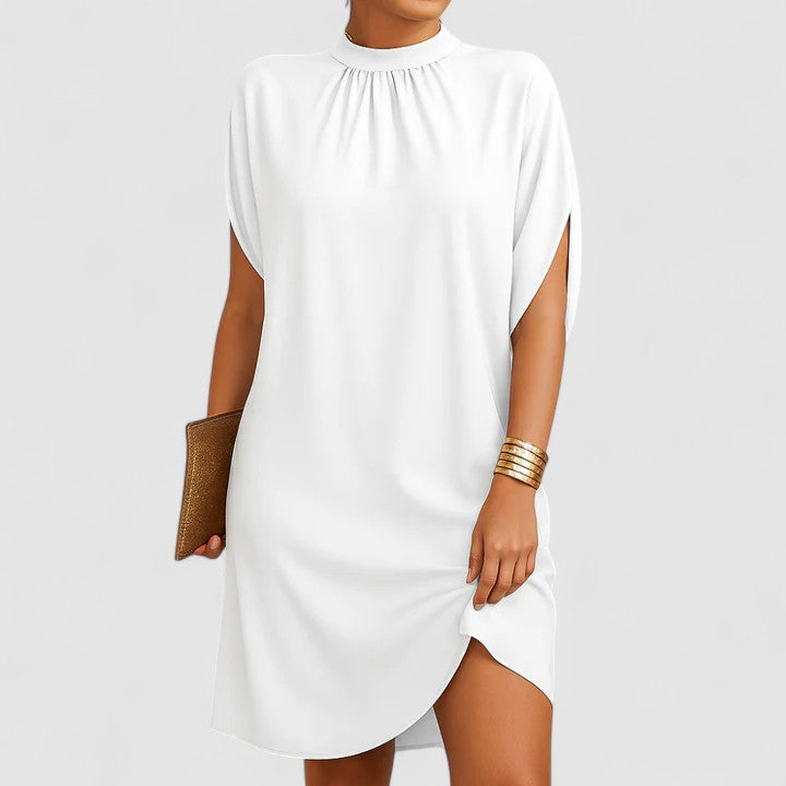 Versatile women's midi dress: mock neck, batwing split sleeves. Blends casual style with elegant flair.