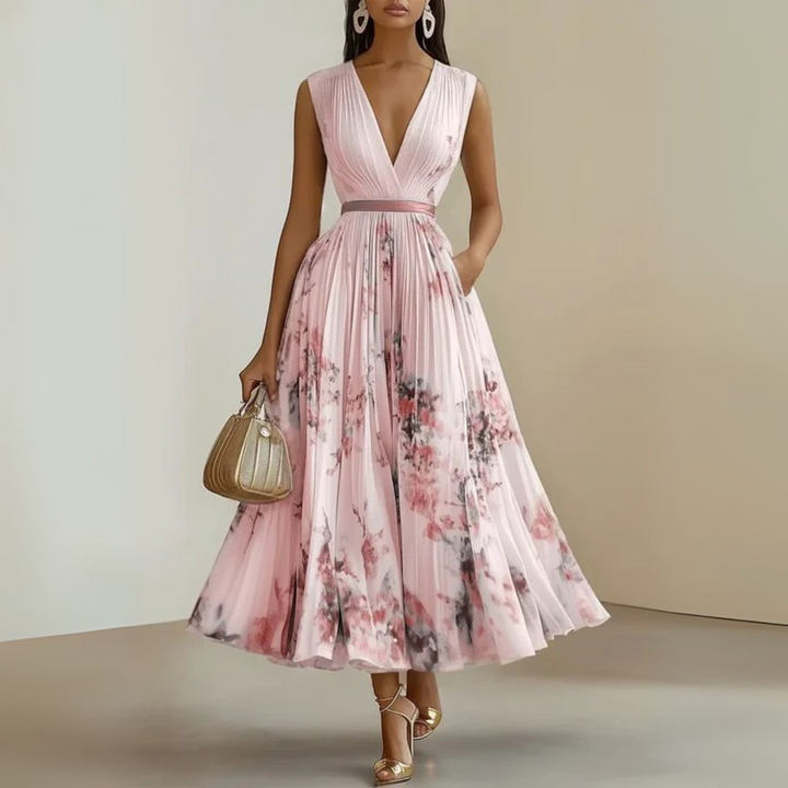 Elegant women's V-neck pleated maxi dress with a cinched waist. A beautiful evening or party dress, complete with pockets.