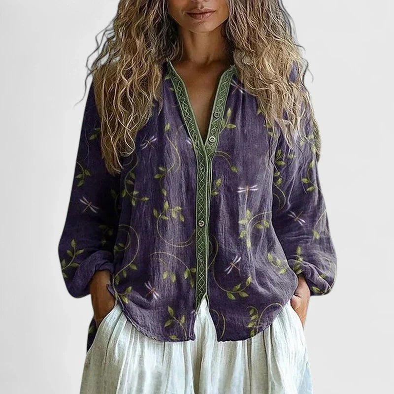 Women's elegant purple blouse, stylish & comfortable for versatile wear, perfect for office or casual chic.