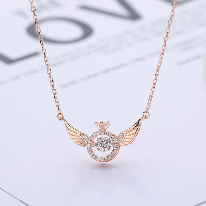 Women's rose gold and white gold angel wing necklace, titanium steel, elegant jewelry accessory.