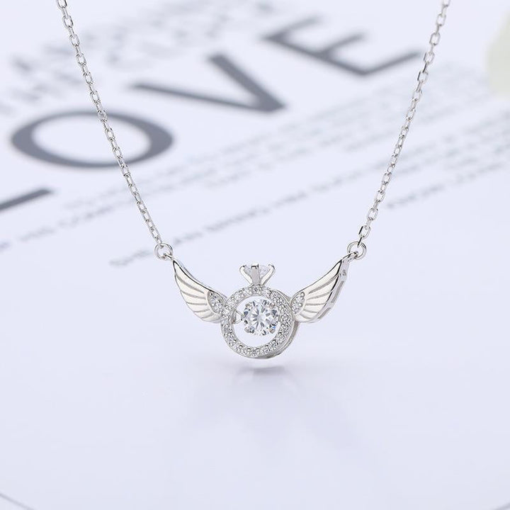 Delicate women's rose gold angel wing necklace, titanium steel jewelry for an elegant look.