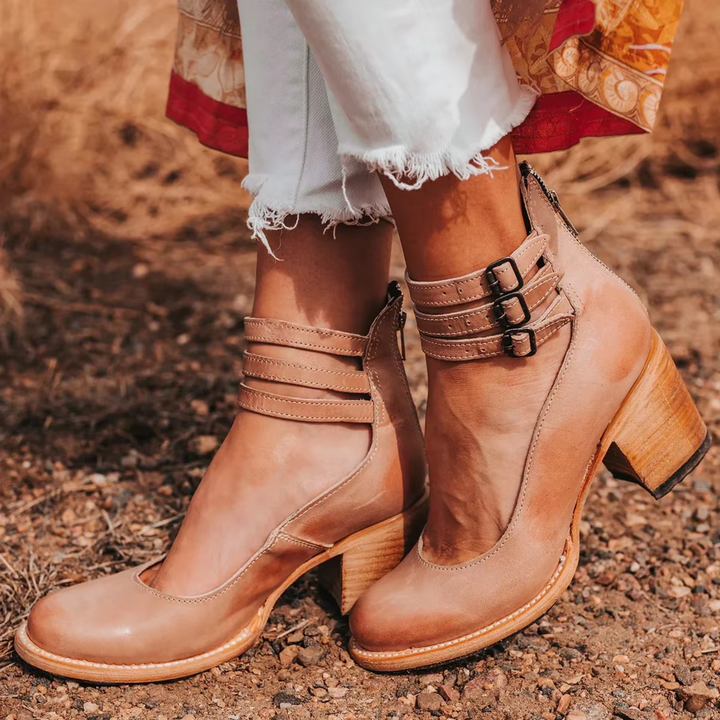 Women's comfortable block heel pumps for work & special events. Designed with a classic round toe & secure ankle strap.