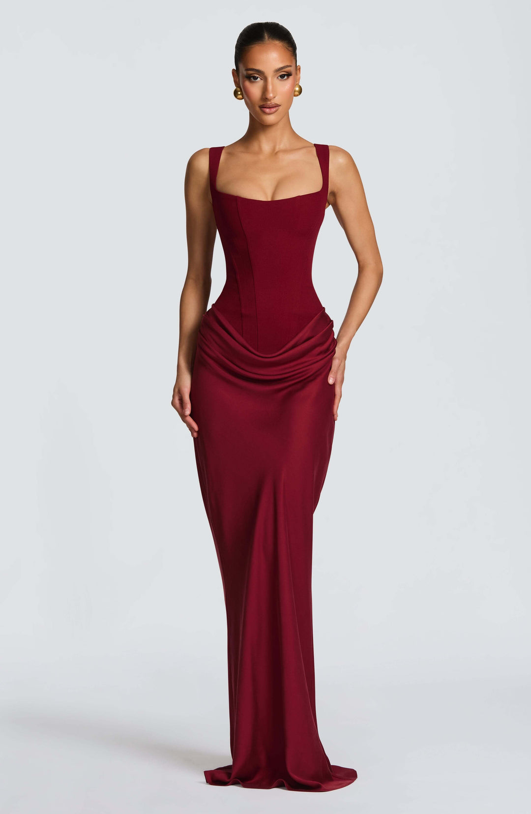 Sophisticated women's ruched bodycon formal dress with a scoop neck. Ideal for evening parties.