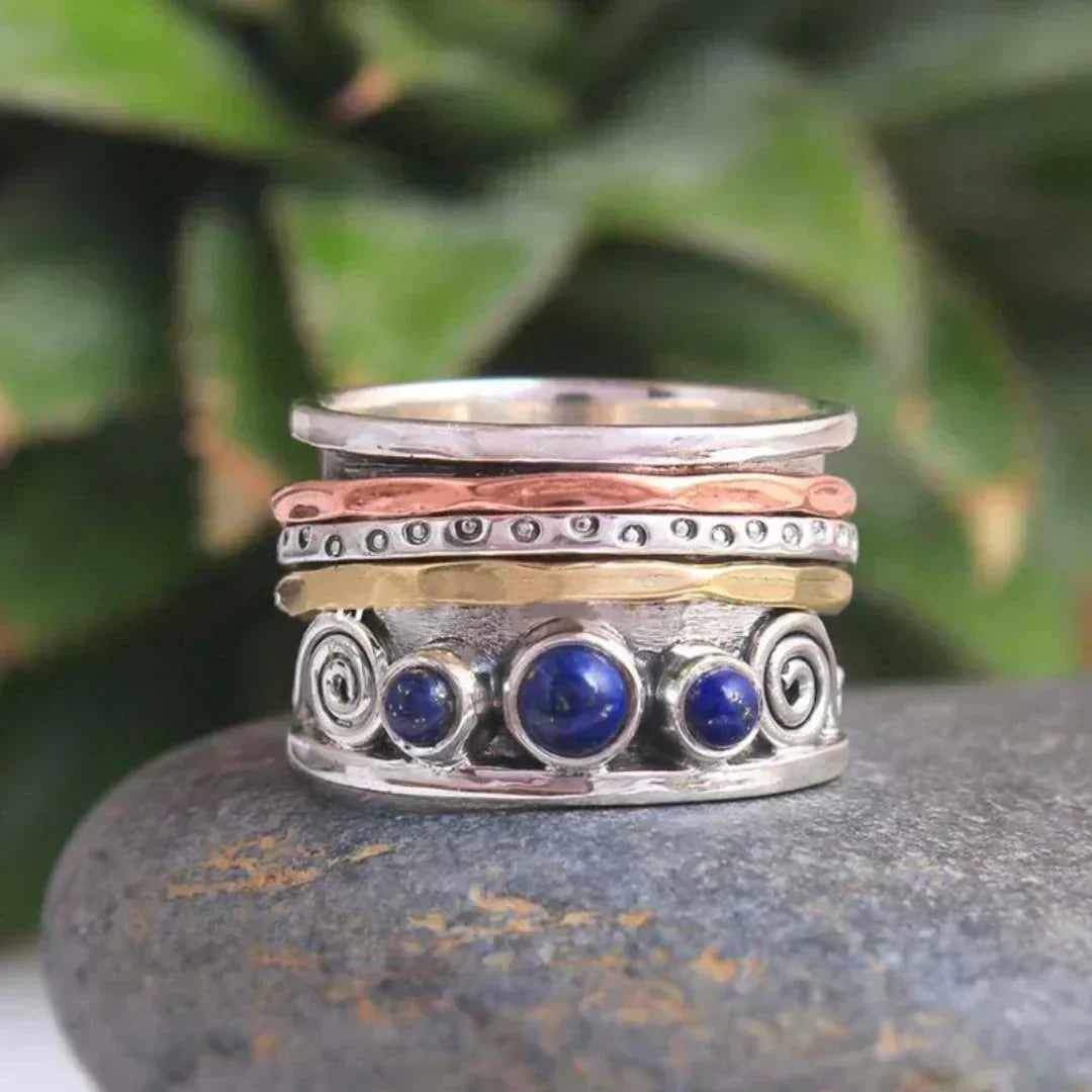 Women's elegant sapphire bohemian meditation ring in silver, perfect for mindfulness and versatile style.