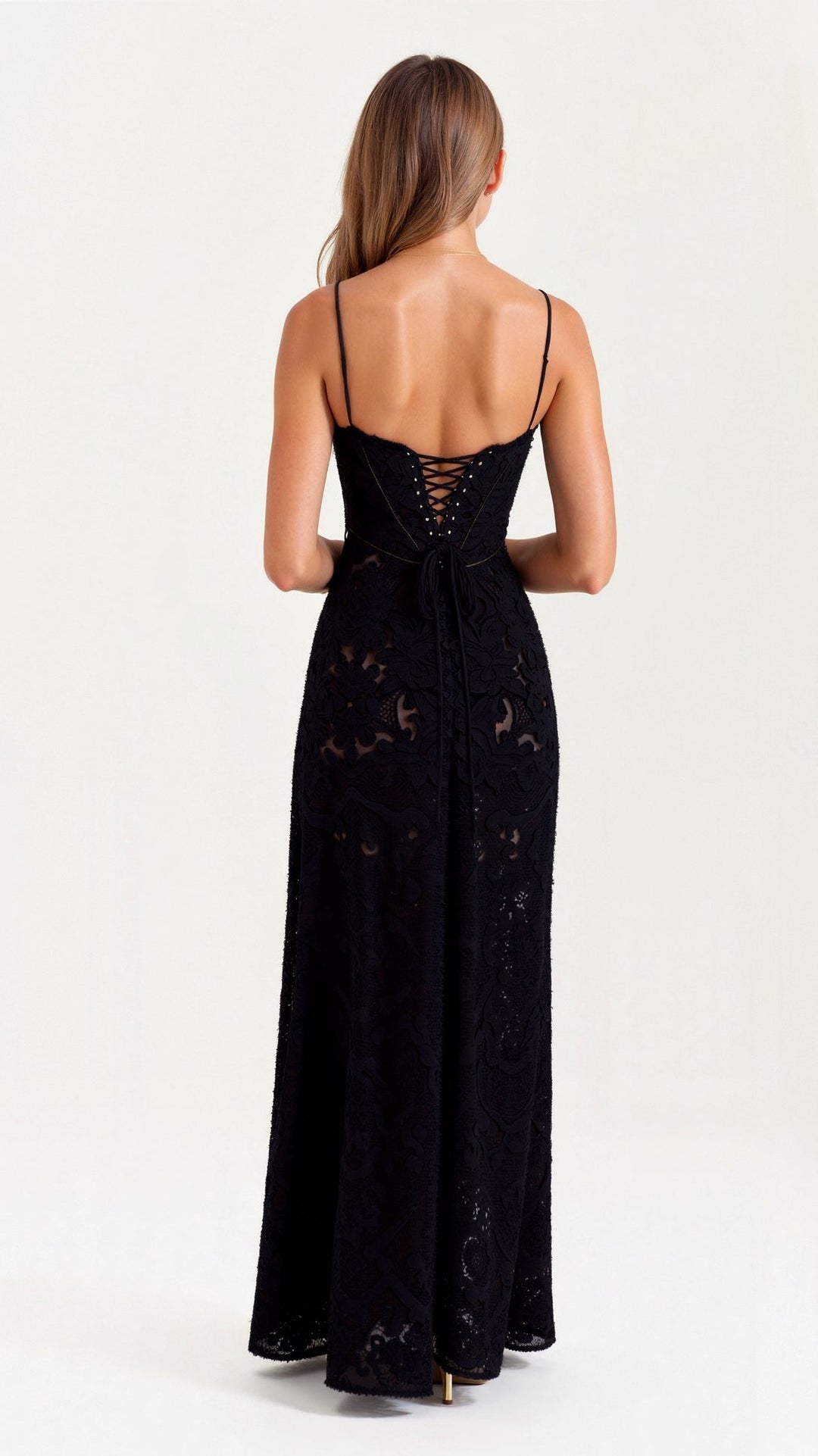 Glamorous women's formal evening gown with sculpted fit and elegant strap detailing.
