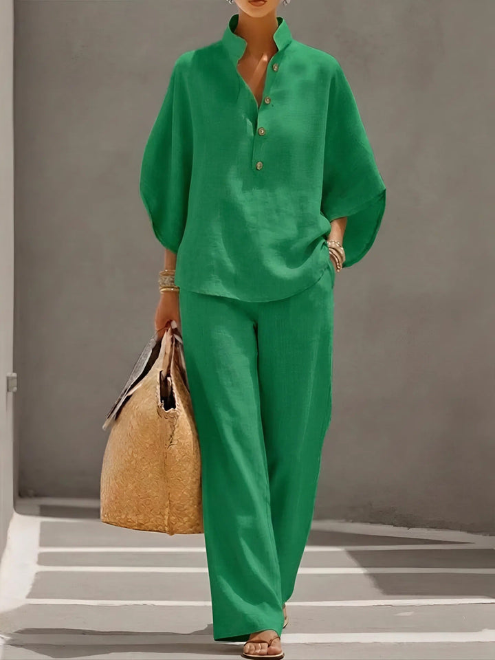 Effortless style: Women's mandarin collar top & wide leg pant set, a versatile vacation wear outfit.