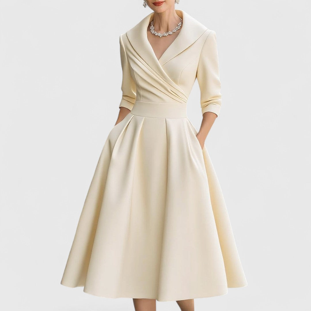 Elegant women's V-neck midi dress, 3/4 sleeves, offering sophisticated and effortless style.
