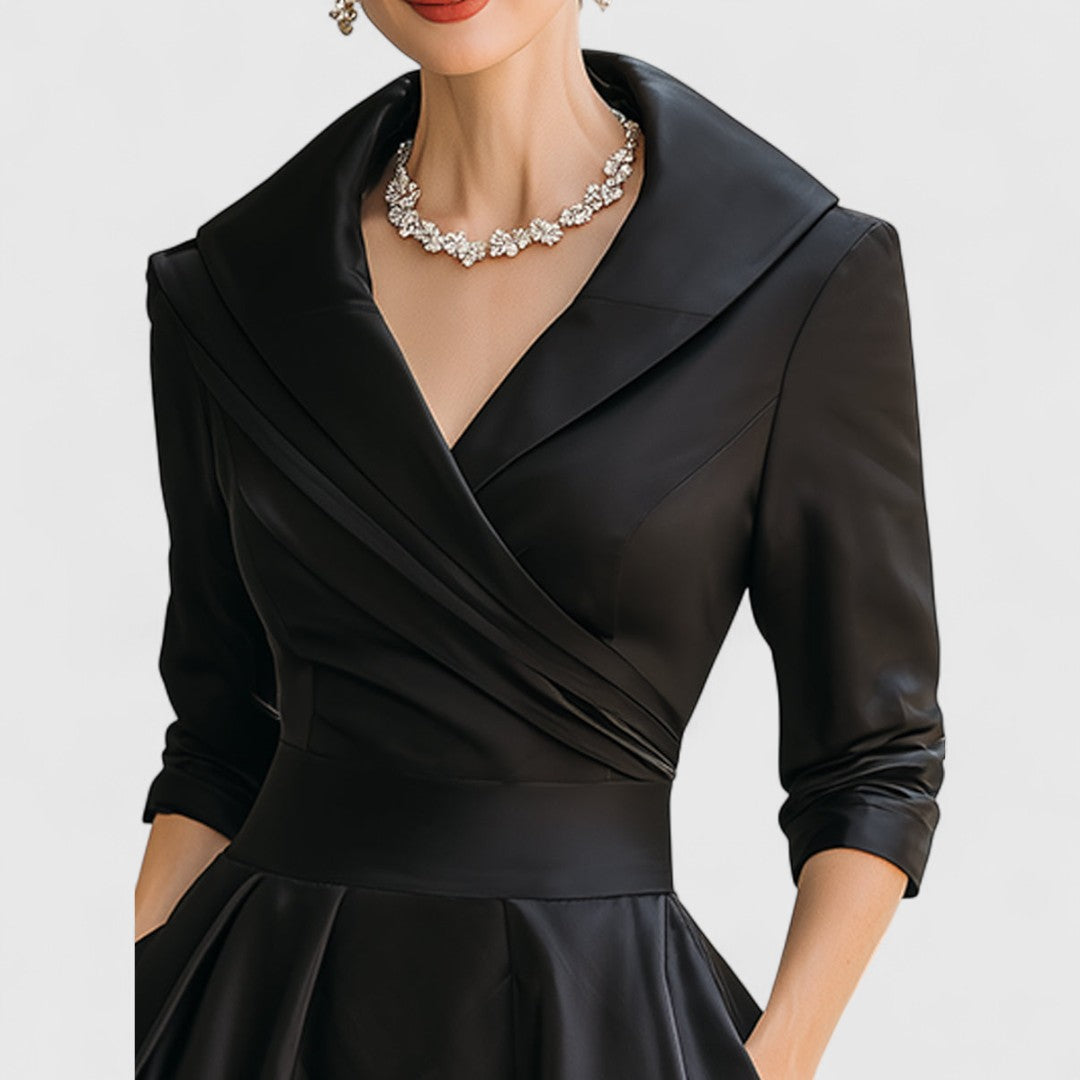 Flattering women's V-neck midi dress with 3/4 sleeves, designed for chic everyday or evening wear.
