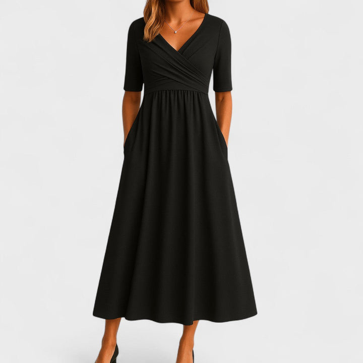 Flattering women's V-neck short sleeve midi dress. Elegant and versatile for party wear and special occasions.